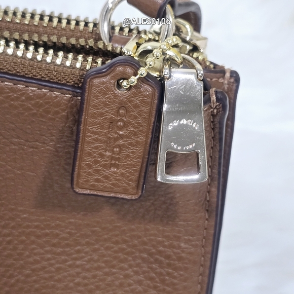 Coach signature brown crossbody with 2 zippers on top. - Picture 6 of 13